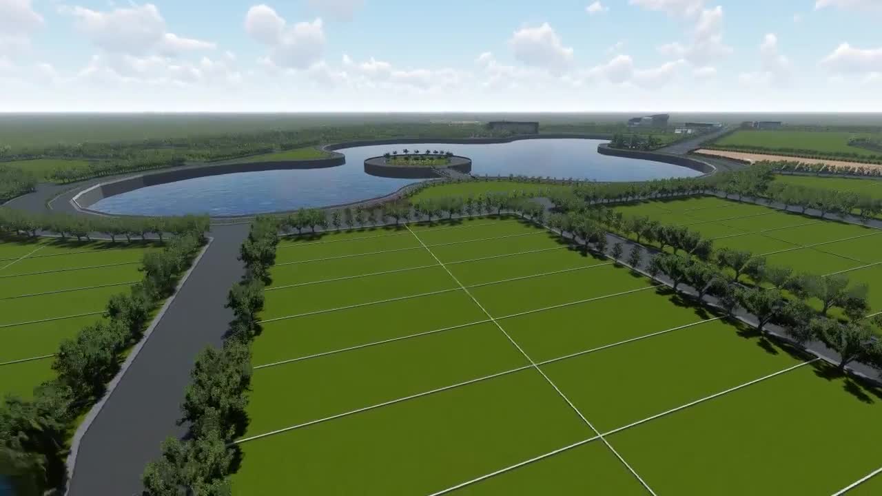 Aerial view of Lake City, with green landscapes surrounding a lake